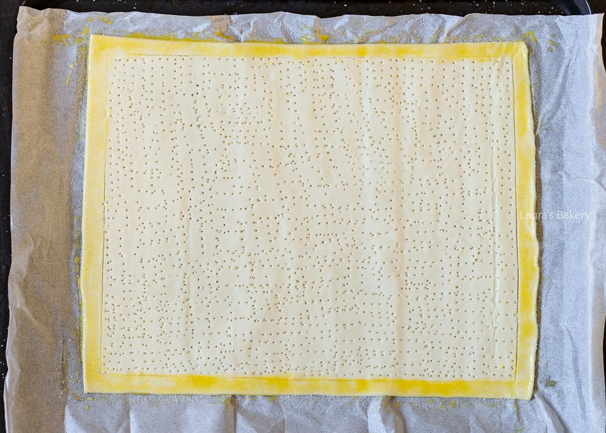 Pricking the puff pastry with a fork