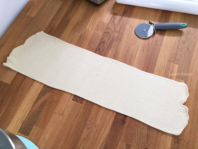 Pizza dough rolled out