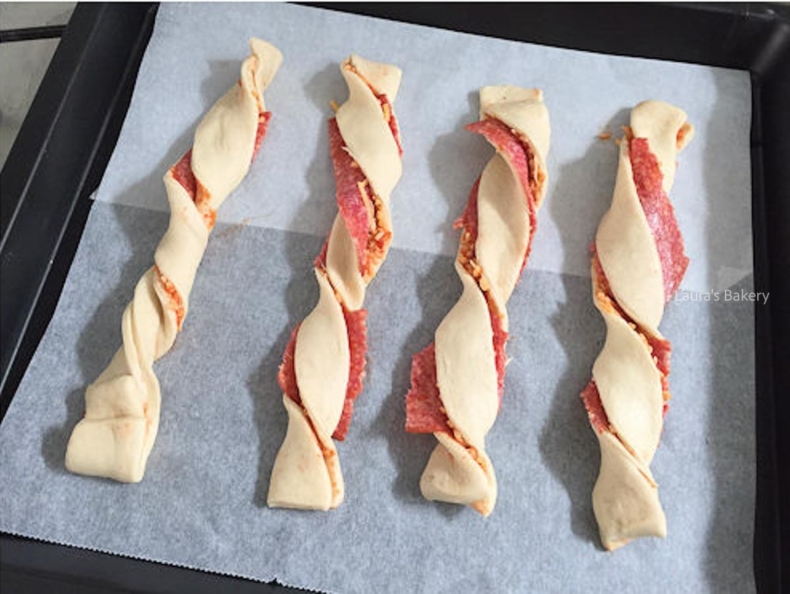 Assembled pizza dough twisted to bake