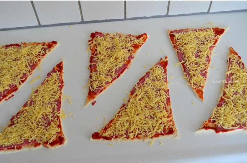 Shredded cheese and Italian seasoning added to the crescent dough