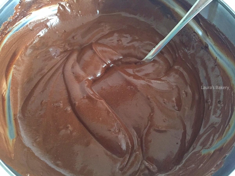 Smooth chocolate batter to make Oreo bundt cake.